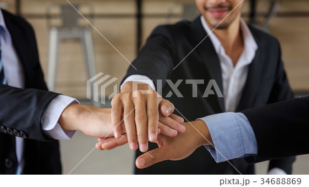 businessman team join and shake hands businessman team join and shake hands 34688869
