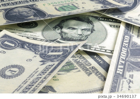 The dollar bill lined up. On a white background 34690137