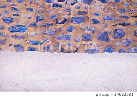 Sand with stones in cement Wall. Sand with stones in cement Wall. 34692631