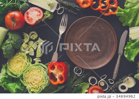 Frame of fresh vegetables on wooden background 34694962