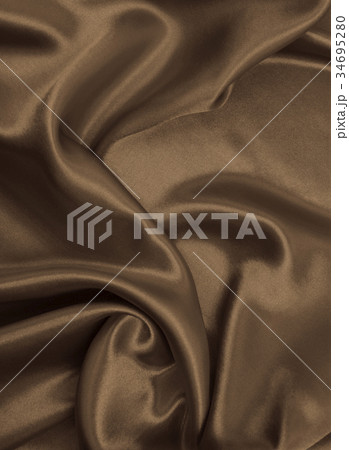 Smooth elegant brown silk or satin texture  34695280