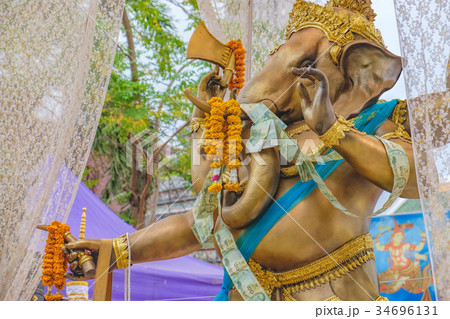 Offering in Buddhist Temple for Good Luck 34696131
