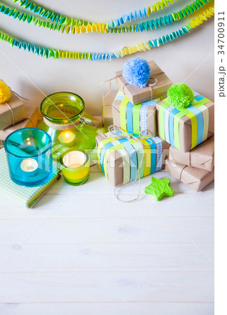 Christmas gifts, candles, candle holders. 34700911