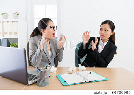 attractive female company manager sneezing 34700996