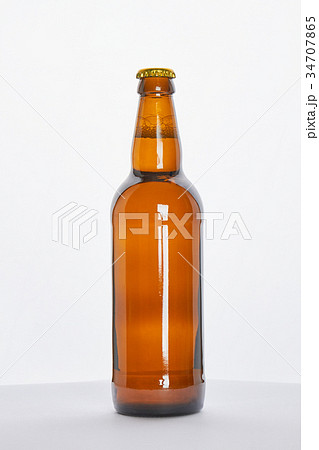 Brown bottle with fresh beer. Brown bottle with fresh beer. 34707865