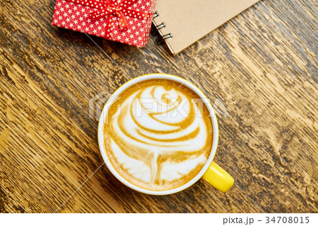 Latte art and gift box. 34708015