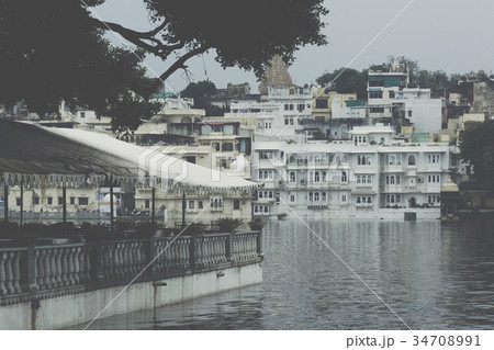 Lake Pichola with City Palace view in Udaipur Lake Pichola with City Palace view in Udaipur 34708991