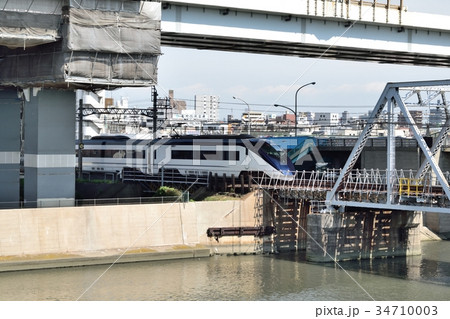 荒川河川敷 荒川橋梁を通過する京成スカイライナー 34710003