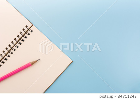 top view of blank notebook and pencil. top view of blank notebook and pencil. 34711248