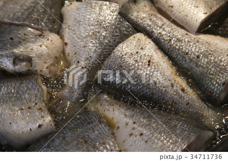 Fish frying in a frying pan Fish frying in a frying pan 34711736