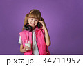 Girl teenager loves to listen to songs 34711957