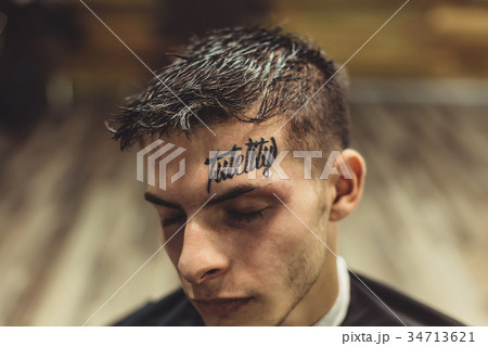 Portrait of man with tattoo 34713621