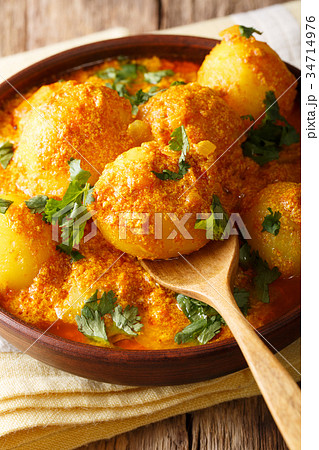 Spicy potato Dum aloo in curry sauce close-up 34714976