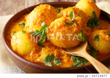 Kashmiri dum aloo 34714977