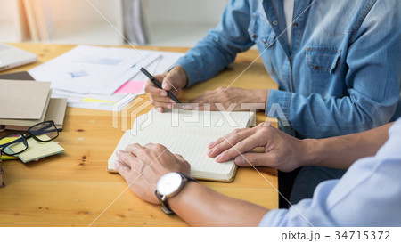 Young students campus helps friend catching up and learning tuto Young students campus helps friend catching up and learning tuto 34715372