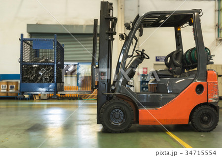 folk lift truck in automotive industrial factory. folk lift truck in automotive industrial factory. 34715554