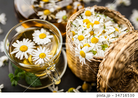 Cup of chamomile tea 34716530