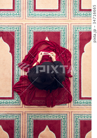 Top aerial view Young beautiful Muslim Woman Top aerial view Young beautiful Muslim Woman 34716665