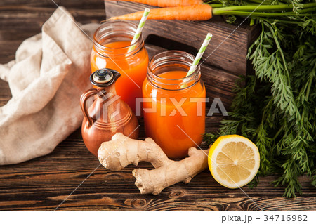 Fresh organic carrot juice Fresh organic carrot juice 34716982
