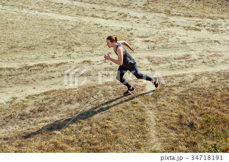 Running sport. Man runner sprinting outdoor in 34718191