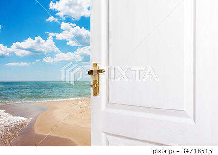 Exit the room to the beach. 34718615