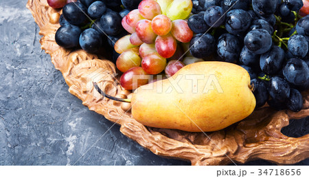 Different grapes on a tray Different grapes on a tray 34718656