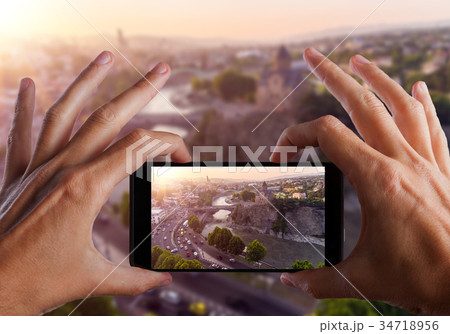 Travel concept. Hands making photo of TBILISI 34718956