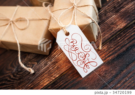 Two gift boxes and tag with Big Sale text on kraft 34720199