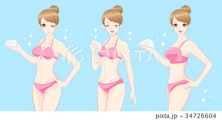 woman take silicone breast implant 34726604