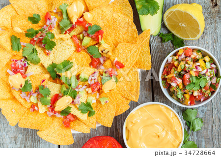 Yellow corn chips nachos 34728664