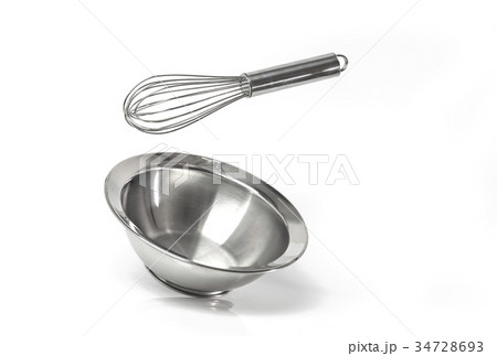 Isolate kitchen utensil wisk and bowl floting 34728693