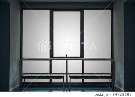 Big window and bench with old blue wall Big window and bench with old blue wall 34728695
