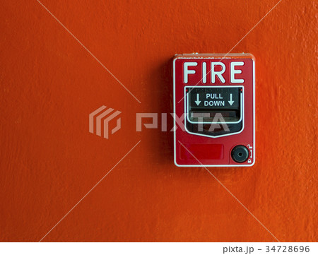 Fire alarm on red wall Fire alarm on red wall 34728696