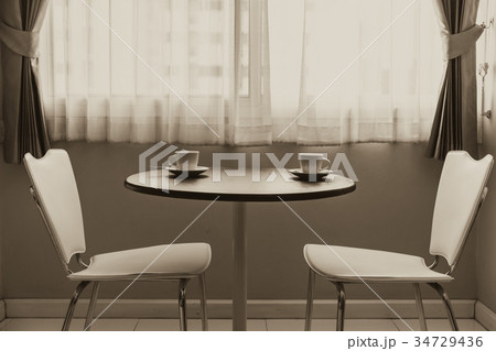 two cup of coffee on table vintage color tone 34729436