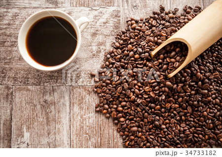 Coffee cup on coffee beans Coffee cup on coffee beans 34733182