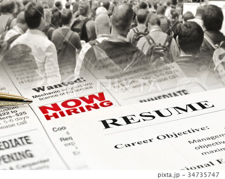Closeup of Resume on Newspaper 34735747