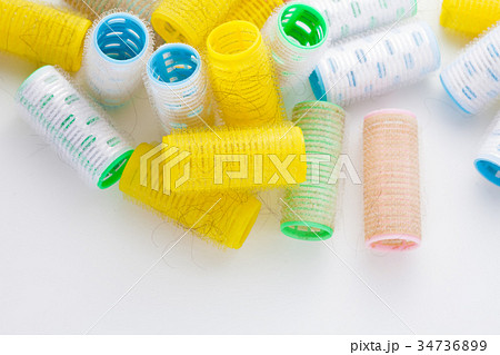 Mass of hair curlers isolated on white background Mass of hair curlers isolated on white background 34736899