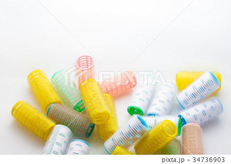 Mass of hair curlers isolated on white background Mass of hair curlers isolated on white background 34736903