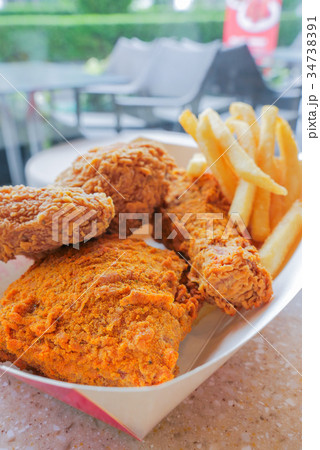 crispy deep fried chicken and french fries crispy deep fried chicken and french fries 34738391