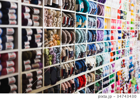 Shelves with colorful wool and yarn 34743430