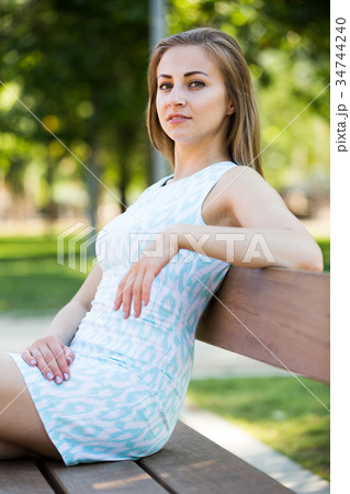 portrait of cheerful young woman portrait in outdoor 34744240