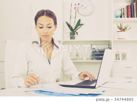 woman working with document woman working with document 34744805