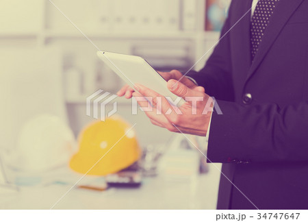 Businessman using smartphone 34747647