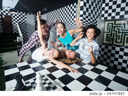 Portrait of family who is satisfied of visit of entertainment 34747885