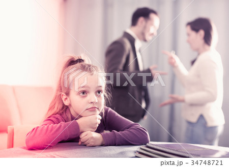 Mom and dad arguing with each other 34748721