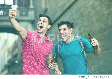 Men with beer are making selfie Men with beer are making selfie 34749221