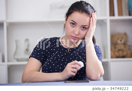 Woman waiting for phone call 34749222