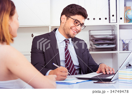 Colleagues meeting in office Colleagues meeting in office 34749478