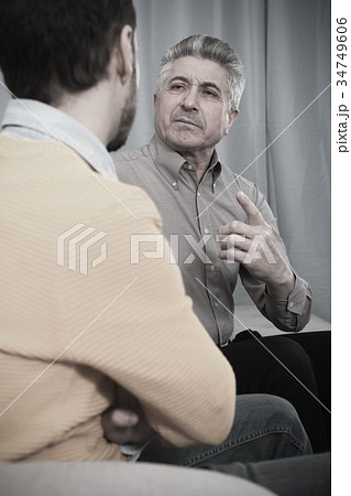 Adult father and son solve problems 34749606