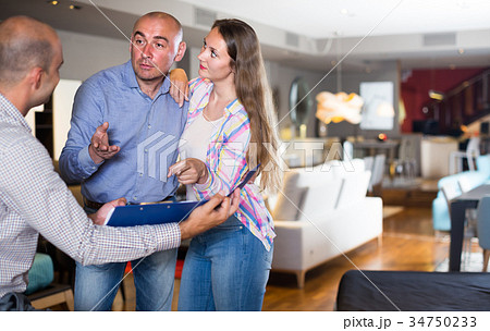 Family is unpleasantly surprised by prices for furniture Family is unpleasantly surprised by prices for furniture 34750233